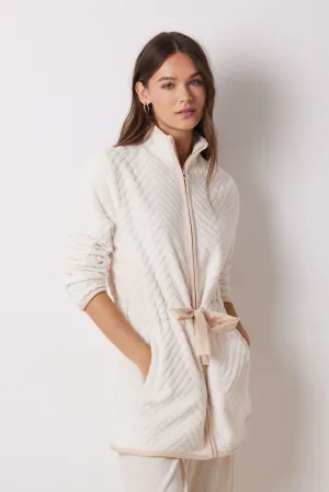 Long fluffy beige zip fastening